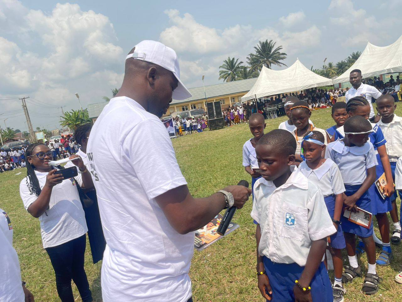 Student receiving exercise books